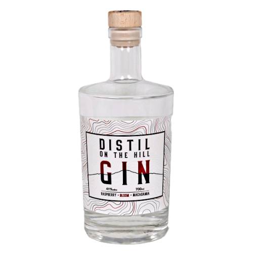 Distil on the Hill gin is a delicately balanced blend of juniper native raspberry local orange blossom macadamia pink pepper and zesty lemon.