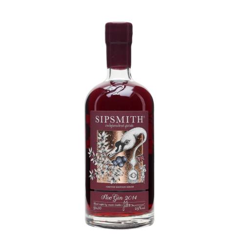 Sipsmith sloe gin with a bright red color and sloe berries.